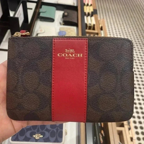 Coach Handbags - CORNER ZIP WRISTLET IN SIGNATURE CANVAS 58035